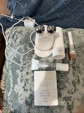 NuFACE Trinity Pro Facial Toning Device with Silver Spheres and White Base